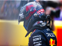 Max Verstappen emerges from his car after winning a sprint race at Circuit of the Americas in Austin, Texas, on October 19, 2024, during the...