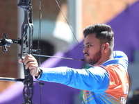 Prathamesh Balchandra Fuge of India competes against Priyansh of India (not in picture) during the quarterfinals match on the second day of...