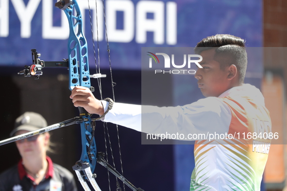 Priyansh of India competes against Prathamesh Balchandra Fuge of India (not in picture) during the quarterfinals match on the second day of...