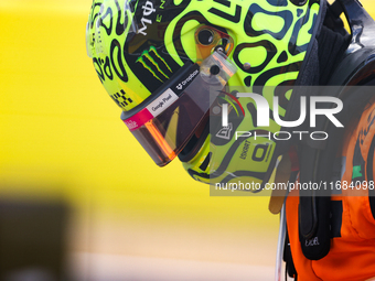 Lando Norris emerges from his car after winning a sprint race at Circuit of the Americas in Austin, Texas, on October 19, 2024, during the F...