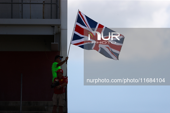 A fan waves the Union Jack during a sprint race at Circuit of the Americas in Austin, Texas, on October 19, 2024, during the Formula 1 Pirel...