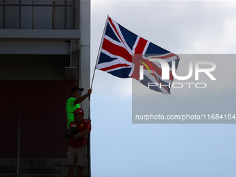 A fan waves the Union Jack during a sprint race at Circuit of the Americas in Austin, Texas, on October 19, 2024, during the Formula 1 Pirel...