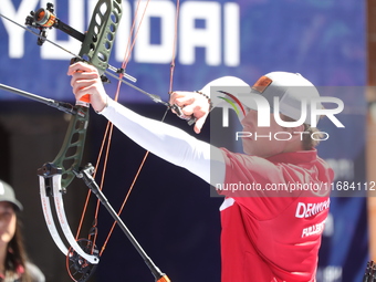 Mathias Fullerton of Denmark competes against Sebastian Garcia of Mexico (not in picture) during the quarterfinals match on the second day o...