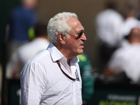 Lawrence Stroll walks onto the grid ahead of a sprint race at Circuit of the Americas in Austin, Texas, on October 19, 2024, during the Form...