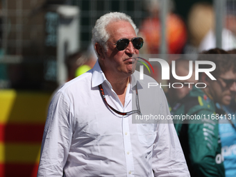 Lawrence Stroll walks onto the grid ahead of a sprint race at Circuit of the Americas in Austin, Texas, on October 19, 2024, during the Form...