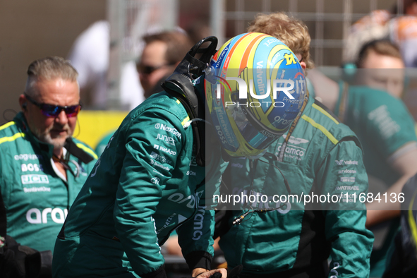 Fernando Alonso prepares for a sprint race at Circuit of the Americas in Austin, Texas, on October 19, 2024, during the Formula 1 Pirelli Un...