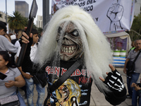 A woman dresses as an Iron Maiden during the Zombie March in Mexico City, Mexico, on October 19, 2024, which starts from the Monument to the...