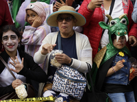 Dozens of people dressed in costume participate in the Zombie March in Mexico City, Mexico, on October 19, 2024, which starts from the Monum...