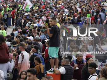 Dozens of people dressed in costume participate in the Zombie March in Mexico City, Mexico, on October 19, 2024, which starts from the Monum...