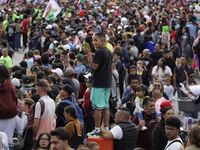 Dozens of people dressed in costume participate in the Zombie March in Mexico City, Mexico, on October 19, 2024, which starts from the Monum...