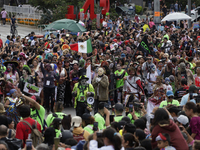 A person dresses as the horror movie character Jason during the Zombie March in Mexico City, Mexico, on October 19, 2024, which starts from...