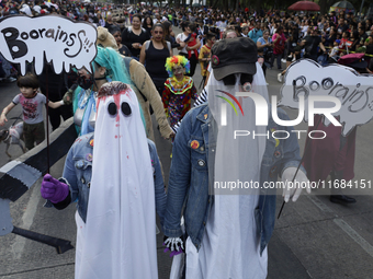 Dozens of people dressed in costume participate in the Zombie March in Mexico City, Mexico, on October 19, 2024, which starts from the Monum...