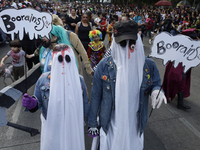 Dozens of people dressed in costume participate in the Zombie March in Mexico City, Mexico, on October 19, 2024, which starts from the Monum...