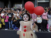 A minor poses dressed as the character It during the Zombie March in Mexico City, Mexico, on October 19, 2024, which starts from the Monumen...