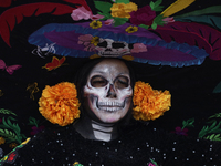 A woman dresses as a catrina during the Zombie March in Mexico City, Mexico, on October 19, 2024, which starts from the Monument to the Revo...