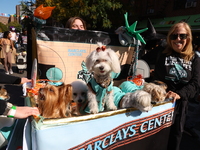 Dogs are dressed as the New York Liberty basketball team for the 34th Annual Tompkins Square Halloween Dog Parade in Tompkins Square Park in...