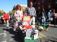 The owners of these dogs make a Beetlejuice-themed cart for the 34th Annual Tompkins Square Halloween Dog Parade in Tompkins Square Park in...