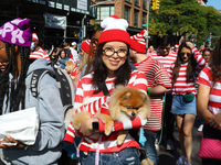 Pomeranian owners and their dogs dress up for the 34th Annual Tompkins Square Halloween Dog Parade in Tompkins Square Park in New York City,...