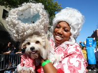 An owner and her dog Queen Charlotte look happy during the 34th Annual Tompkins Square Halloween Dog Parade in Tompkins Square Park in New Y...