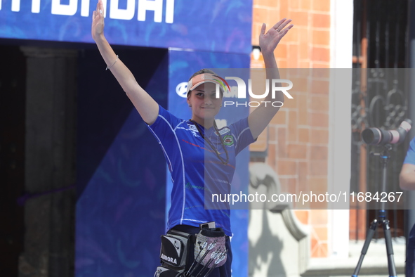 Elisa Roner of Italy competes against Andrea Maya Becerra of Mexico (not in picture) during the compound women's quarterfinals match on the...