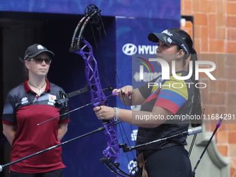 Sara Lopez of Colombia competes against Alexis Ruiz of the United States (not in picture) during the compound women's quarterfinals match on...