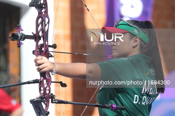 Dafne Quintero of Mexico competes against Ella Gibson of Great Britain (not in picture) during the compound women's quarterfinals match on t...