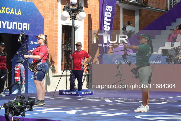 Dafne Quintero of Mexico and Ella Gibson of Great Britain compete during the compound women's quarterfinals match on the second day of the T...