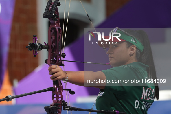 Dafne Quintero of Mexico competes against Ella Gibson of Great Britain (not in picture) during the compound women's quarterfinals match on t...