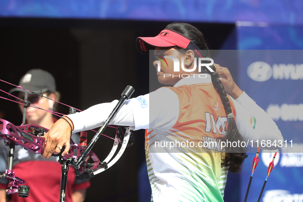 Jyothi Surekha of Vennam competes against Meeri-Marita Pass of Estonia (not in picture) during the compound women's quarterfinals match on t...