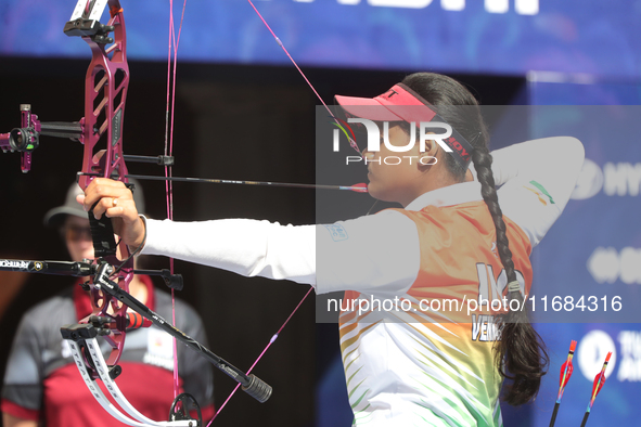 Jyothi Surekha of Vennam competes against Meeri-Marita Pass of Estonia (not in picture) during the compound women's quarterfinals match on t...