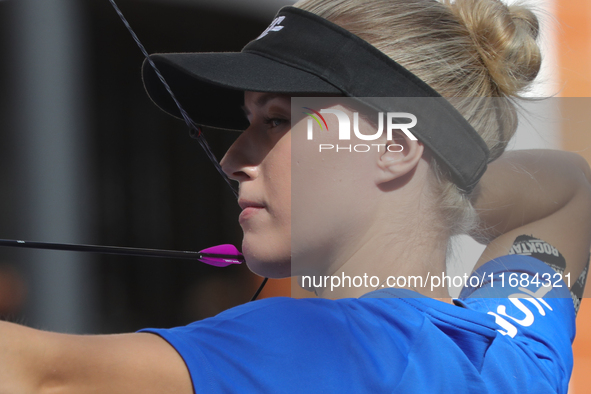 Meeri-Marita Pass of Estonia competes against Jyothi Surekha of Vennam (not in picture) during the compound women's quarterfinals match on t...