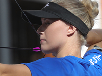 Meeri-Marita Pass of Estonia competes against Jyothi Surekha of Vennam (not in picture) during the compound women's quarterfinals match on t...