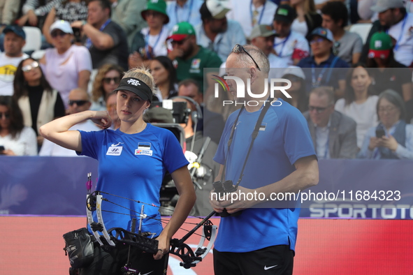 Meeri-Marita Pass of Estonia competes against Jyothi Surekha of Vennam (not in picture) during the compound women's quarterfinals match on t...