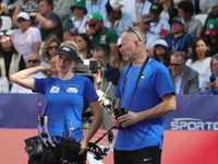 Meeri-Marita Pass of Estonia competes against Jyothi Surekha of Vennam (not in picture) during the compound women's quarterfinals match on t...