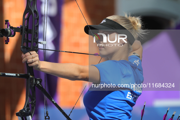 Meeri-Marita Pass of Estonia competes against Jyothi Surekha of Vennam (not in picture) during the compound women's quarterfinals match on t...