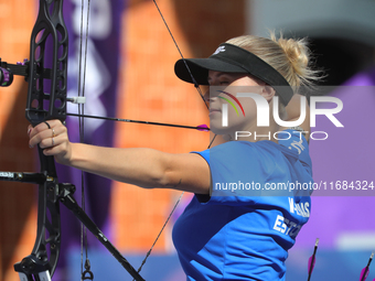 Meeri-Marita Pass of Estonia competes against Jyothi Surekha of Vennam (not in picture) during the compound women's quarterfinals match on t...