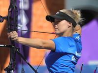 Meeri-Marita Pass of Estonia competes against Jyothi Surekha of Vennam (not in picture) during the compound women's quarterfinals match on t...