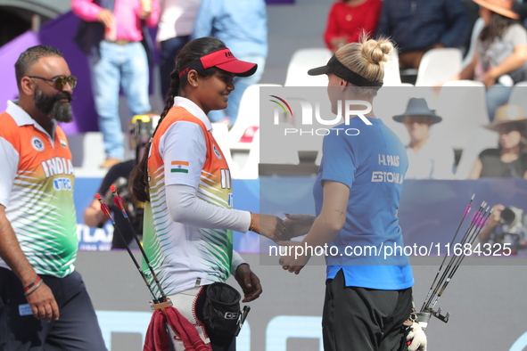 Jyothi Surekha of Vennam and Meeri-Marita Pass of Estonia compete during the compound women's quarterfinals match on the second day of the T...