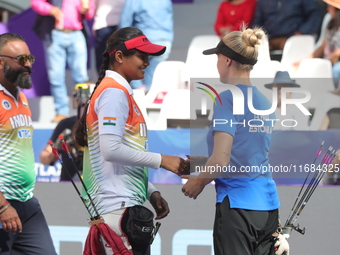 Jyothi Surekha of Vennam and Meeri-Marita Pass of Estonia compete during the compound women's quarterfinals match on the second day of the T...