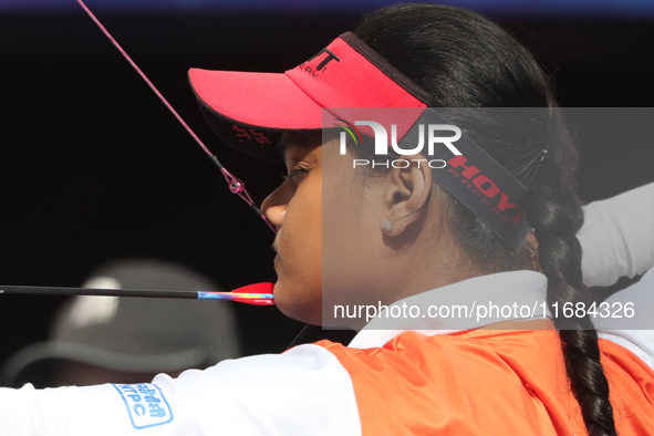 Jyothi Surekha of Vennam competes against Meeri-Marita Pass of Estonia (not in picture) during the compound women's quarterfinals match on t...