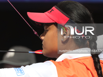 Jyothi Surekha of Vennam competes against Meeri-Marita Pass of Estonia (not in picture) during the compound women's quarterfinals match on t...