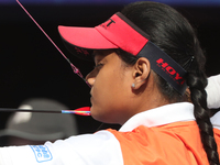 Jyothi Surekha of Vennam competes against Meeri-Marita Pass of Estonia (not in picture) during the compound women's quarterfinals match on t...