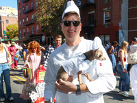 A dog and his owner dress as chefs for the 34th Annual Tompkins Square Halloween Dog Parade in Tompkins Square Park in New York City, USA, o...