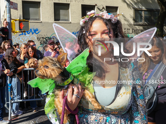 A dog and owner dress as fairies for the 34th Annual Tompkins Square Halloween Dog Parade in Tompkins Square Park in New York City, USA, on...