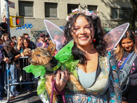 A dog and owner dress as fairies for the 34th Annual Tompkins Square Halloween Dog Parade in Tompkins Square Park in New York City, USA, on...