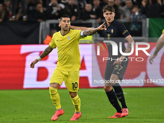 Nicolo Savona of Juventus F.C. and Mattia Zaccagni of S.S. Lazio are in action during the 8th day of the Serie A Championship between Juvent...