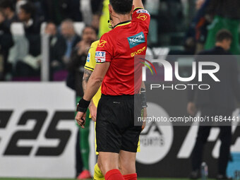 Referee Juan Luca Sacchi sends off Alessio Romagnoli of S.S. Lazio during the 8th day of the Serie A Championship between Juventus F.C. and...