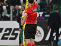 Referee Juan Luca Sacchi sends off Alessio Romagnoli of S.S. Lazio during the 8th day of the Serie A Championship between Juventus F.C. and...