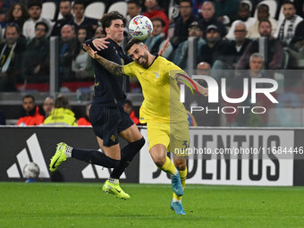 Dusan Vlahovic of Juventus F.C. and Mario Gila of S.S. Lazio are in action during the 8th day of the Serie A Championship between Juventus F...