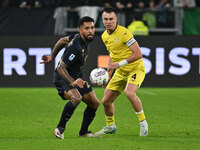 Douglas Luiz of Juventus F.C. and Patric of S.S. Lazio are in action during the 8th day of the Serie A Championship between Juventus F.C. an...